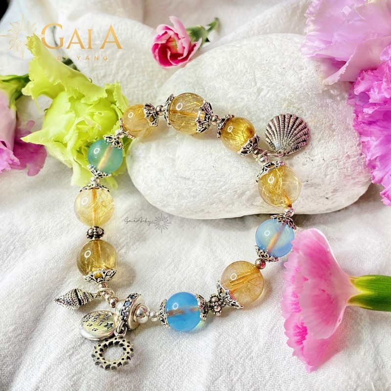 Vòng tay đá thạch anh tóc vàng phổ thông + aquamarine phối charm bạc - Gaia By Yang