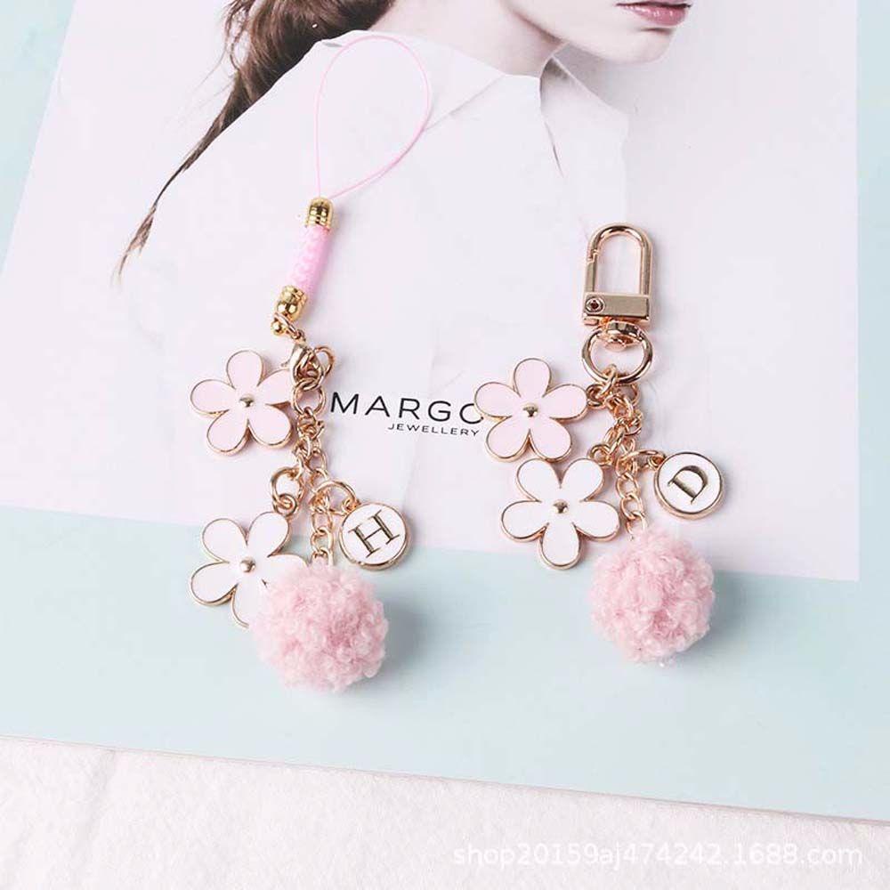 Móc Điện Thoại Bằng Kim Loại Họa Tiết Hoa Và Chữ Kèm Dây Đeo Hiệu Balenciages Thời Trang Cho Nữ