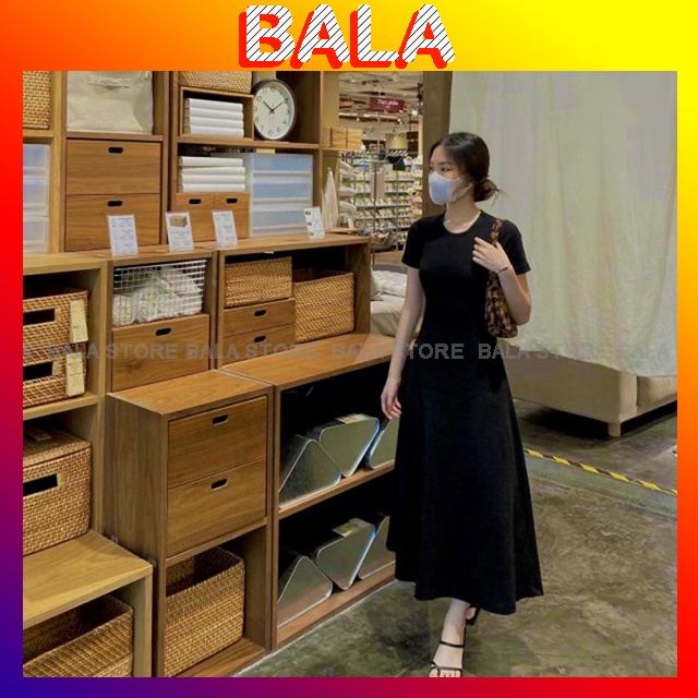 Đầm MiDi Đen Cổ Tròn Dáng Dài Cut Out Lưng