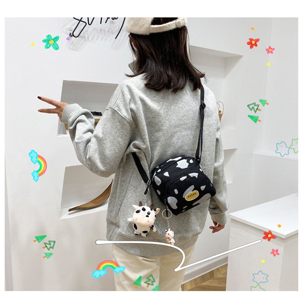 Túi đeo chéo có thể đeo vai họa tiết bò sữa thời trang sành điệu cho nữ