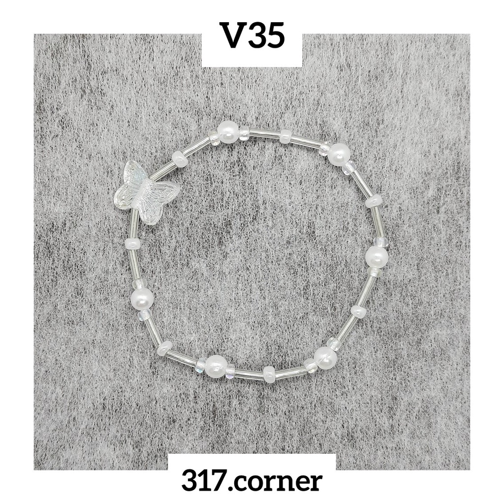 Vòng tay hạt cườm + mặt bướm hologram - V35 - 317.corner
