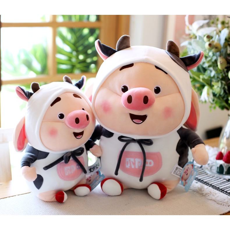 Thú bông heo tik tok mang áo bò sữa