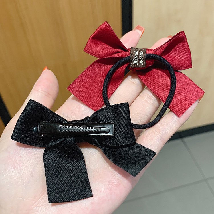 Kẹp tóc đính nơ phong cách ngọt ngào đáng yêu cho nữ