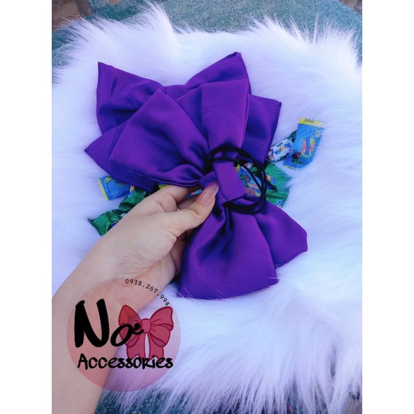 Cột, kẹp nơ màu tím