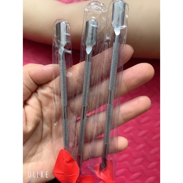 cây đẩy da inox dùng làm móng nail