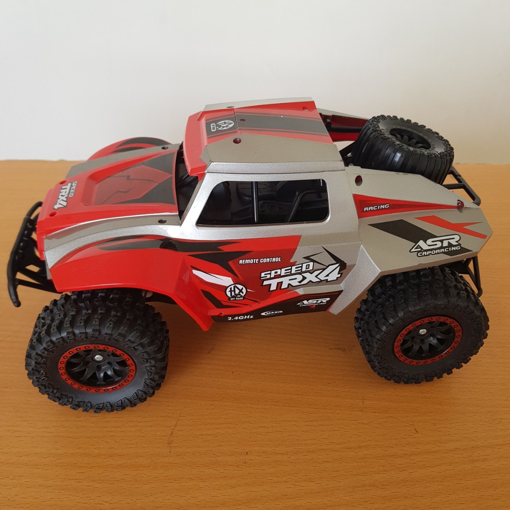 Ô TÔ ĐỊA HÌNH ĐIỀU KHIỂN TỪ XA  HIGH SPEED TRX4 2 MÀU ĐEN ĐỎ, HẦM HỐ, CHẮC CHẮN, SIÊU BỀN, BÉ SẼ THÍCH MÊ