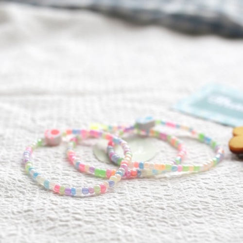 Vòng tay hạt cườm màu pastel charm bàn chân pet đáng yêu