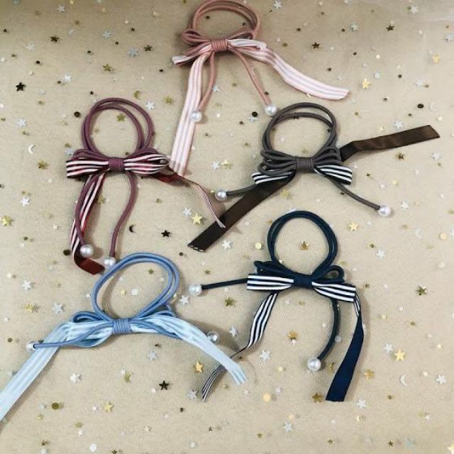 CỘT TÓC NƠ RUY BĂNG SỌC