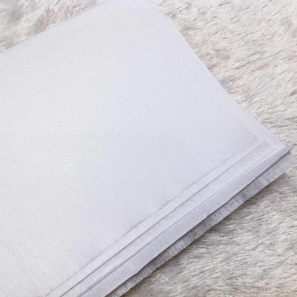 Keo hạt ủi nhiệt trắng khổ 1m2 và 1 mét đen giấy hột dùng ép nẹp cố định áo