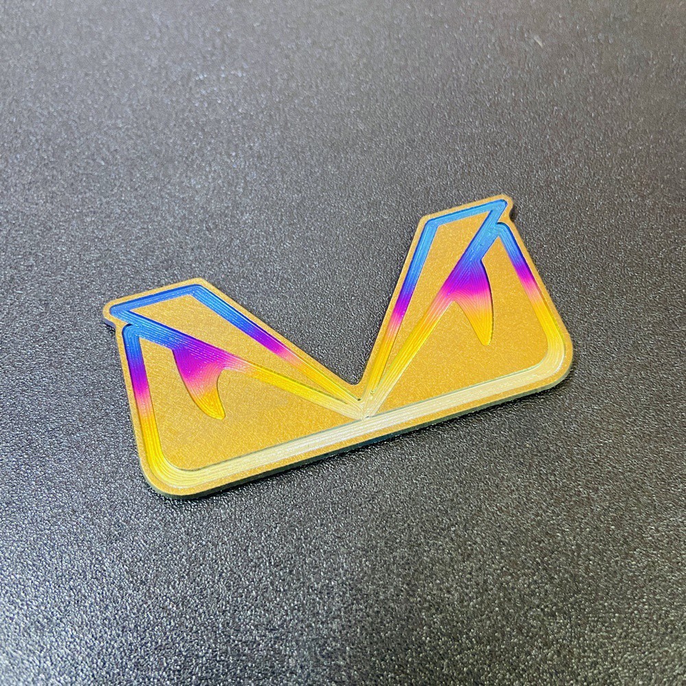 TEM trang trí xe máy HOẠT HÌNH MẮT CÚ chất liệu TITANNIUM