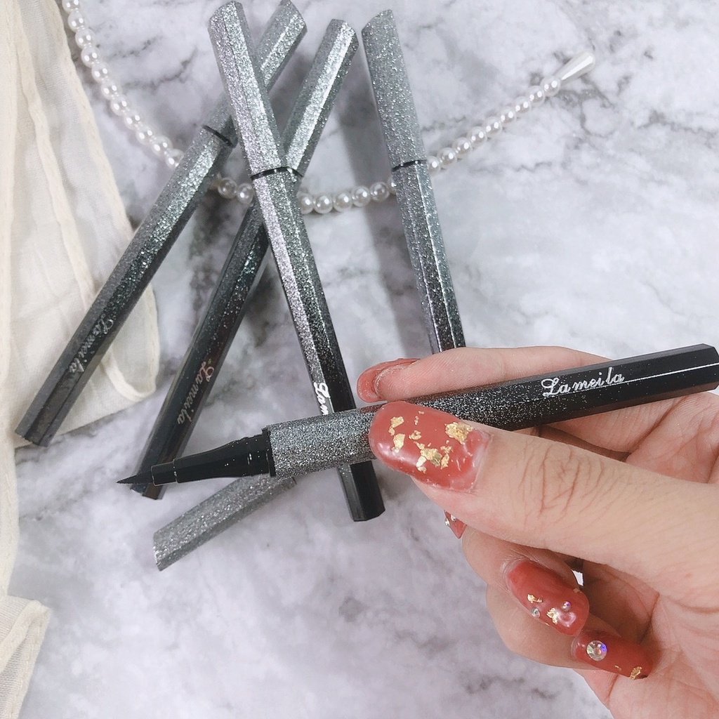 Bán buôn Tin tức Màu đỏ New Star Eye Pen Makeup Black Eye Line Pincush Sinh viên không thấm nước không dễ bị smudge người mới bắt đầu