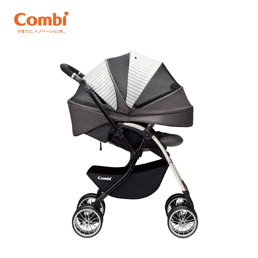 Xe đẩy Combi Umbretta 4 bánh quay tự động ghi silver