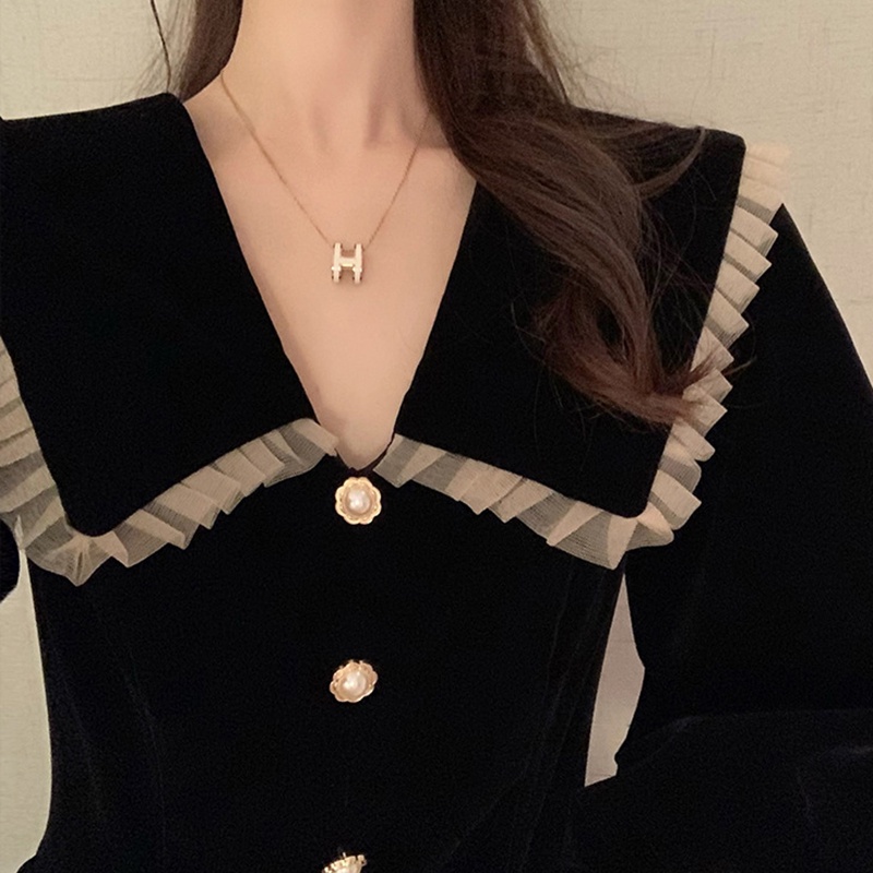 Đầm nhung IELGY màu đen dài tay phong cách Pháp thời trang cho nữ