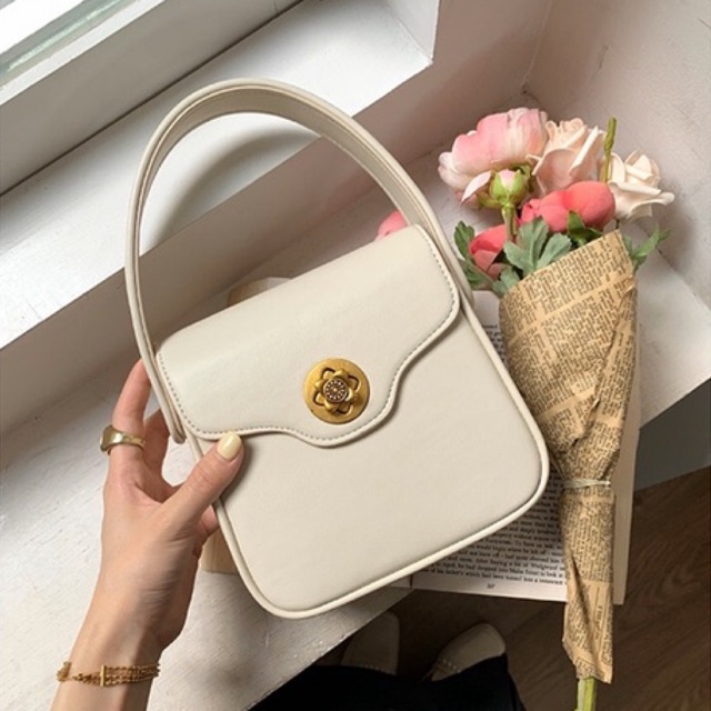 Túi xách thiết kế cao cấp khoá cài bông hoa - HAKEN