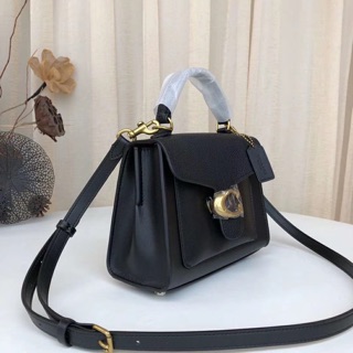Túi Coach tabby top handle