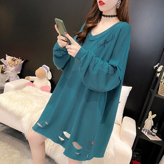 Long sleeves and holes in large blouse and skirt