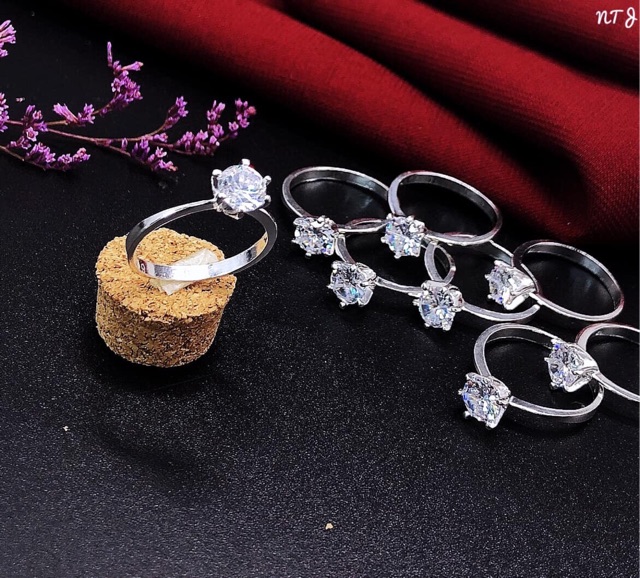 NHẪN NỮ THÂN TRƠN MẶT ĐÁ 4 CHẤU - NHẪN NỮ BẠC TA