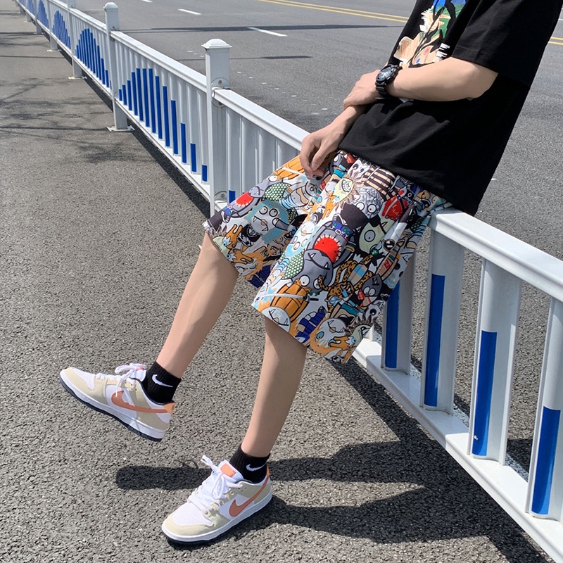 Quần ngắn họa tiết hoạt hình thời trang đi biển dành cho nam