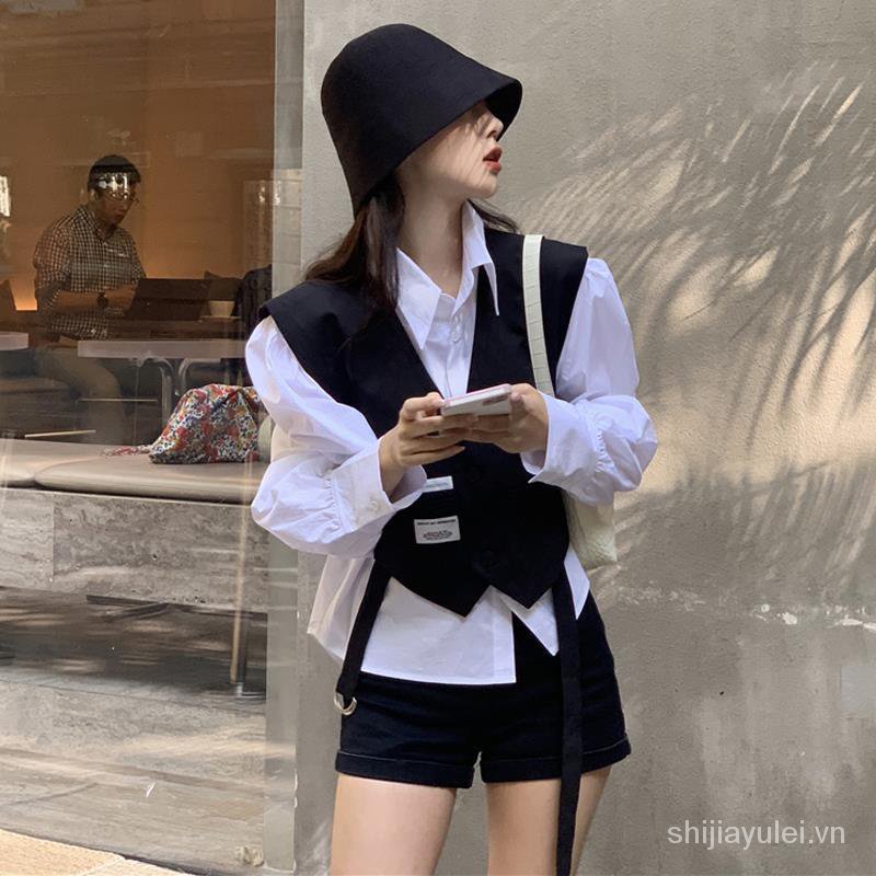 Set áo sát nách màu đen và quần ngắn phong cách retro Hong Kong thời trang mùa thu cho nữ 2021