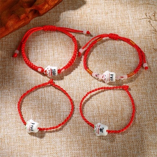 Vòng tay dây cài, dây rút màu đỏ con mèo may mắn