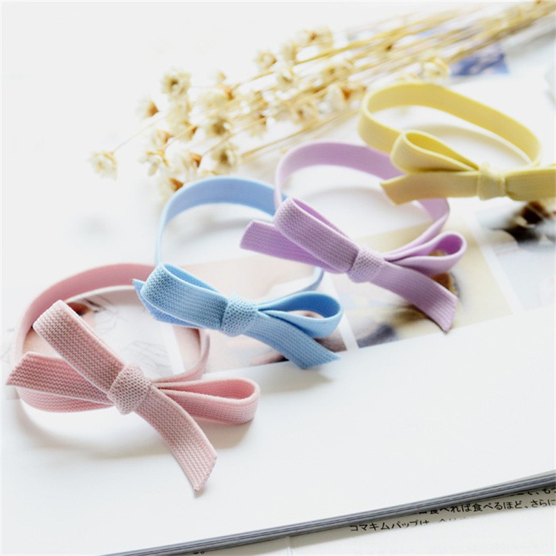Dây Buộc Tóc Cao Su Co Giãn Màu Trơn Hình Nơ Đơn Giản Cho Nữ