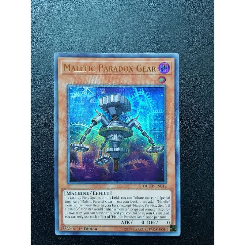 Lá thẻ bài Malefic Paradox Gear - DUOV-EN048 - Ultra Rare 1st Edition