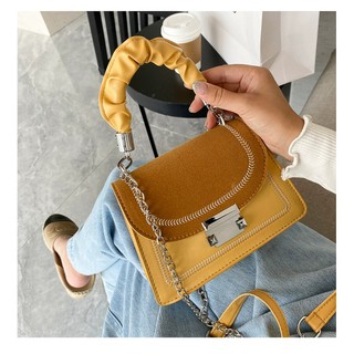 Túi xách da lộn cầm tay