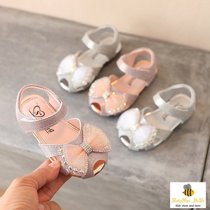 Sandal rọ hở mũi tập đi bé gái - Dép quai hậu nơ ren nhiều lớp đính kim sa lấp lánh cho bé, đế kếp A107 (sz 15-19;21-25)