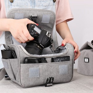 Thích hợp cho túi máy ảnh Canon SLR nữ Túi lưu trữ kỹ thuật số Nikon micro đơn túi nam ống kính bảo vệ nắp chụp ảnh một 