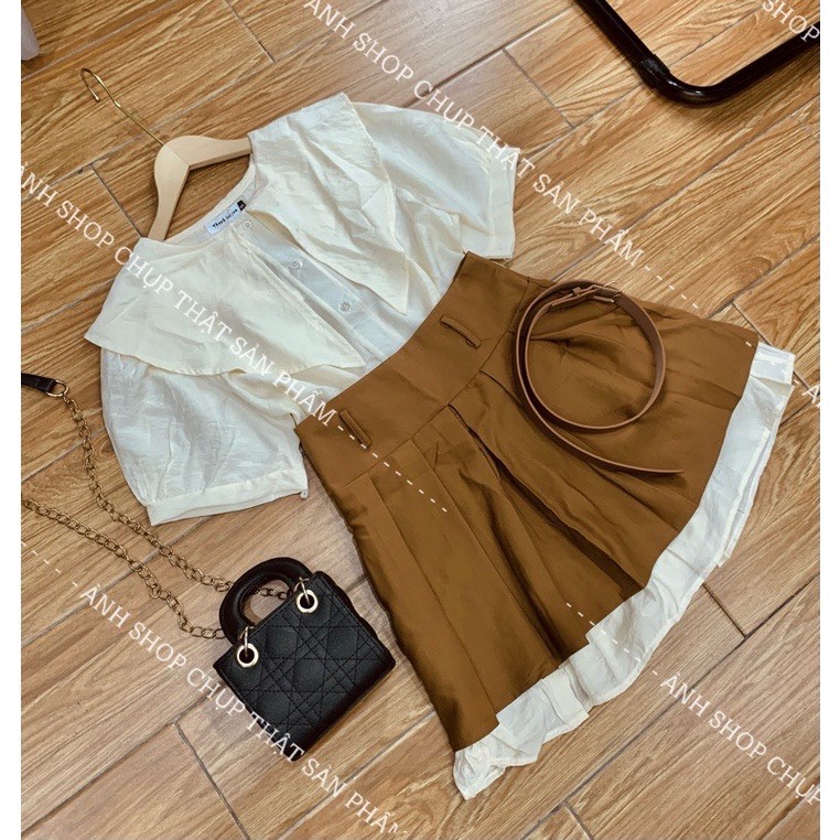 Set bộ lẻ GUU áo sơ mi cổ bèo nhọn màu be kèm chân váy xếp ly dáng ngắn màu nâu tây tôn da phong cách hàn quốc