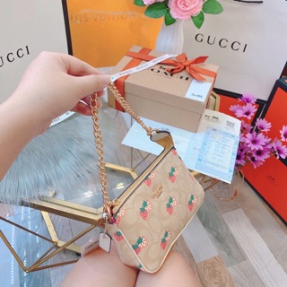 Túi Coach kẹp nách