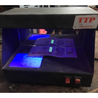 Máy kiểm tra tiền giả