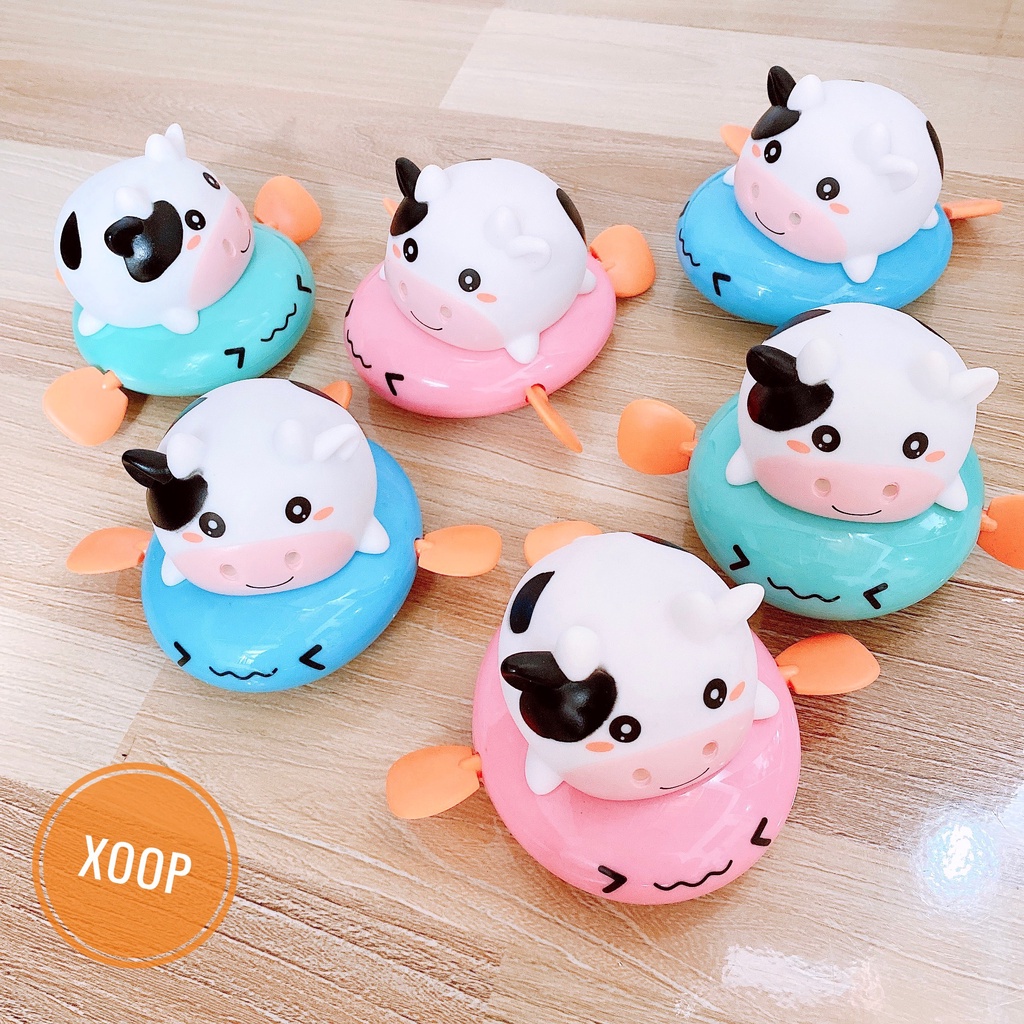 Đồ chơi nhà tắm bò sữa chèo thuyền phun nước vặn cót ngộ nghĩnh đáng yêu cho bé