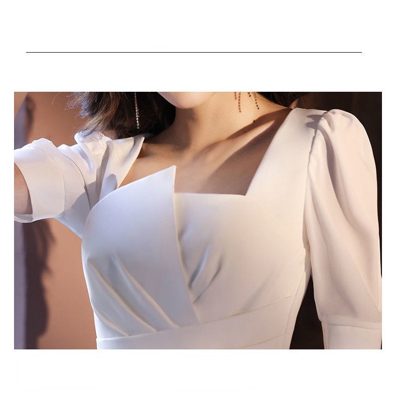 Đầm trắng ôm eo cao lệch tà thời trang mùa thu 2021