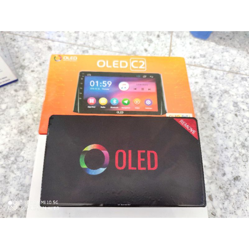 Màn hình dvd android OLED C2 , tặng camera lùi AHD + camera hành trình