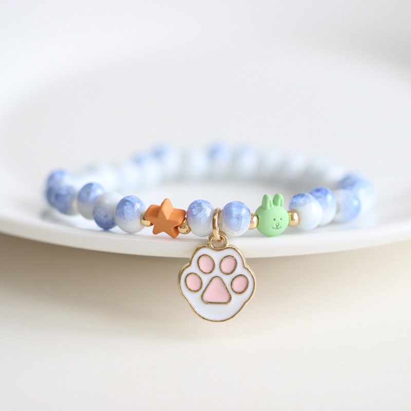 Vòng tay ngọc trai và gốm phối mặt hình động vật / sao biển / lọ / mặt cười dễ thương thời trang cho nữ