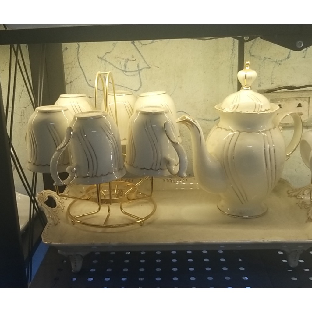 Bộ ấm kèm 6 chén ,giá treo và khay