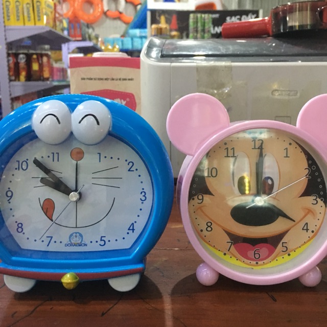 Đồng hồ báo thức doremon-mickey