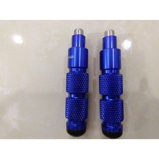 Gù chống đổ sau xe máy