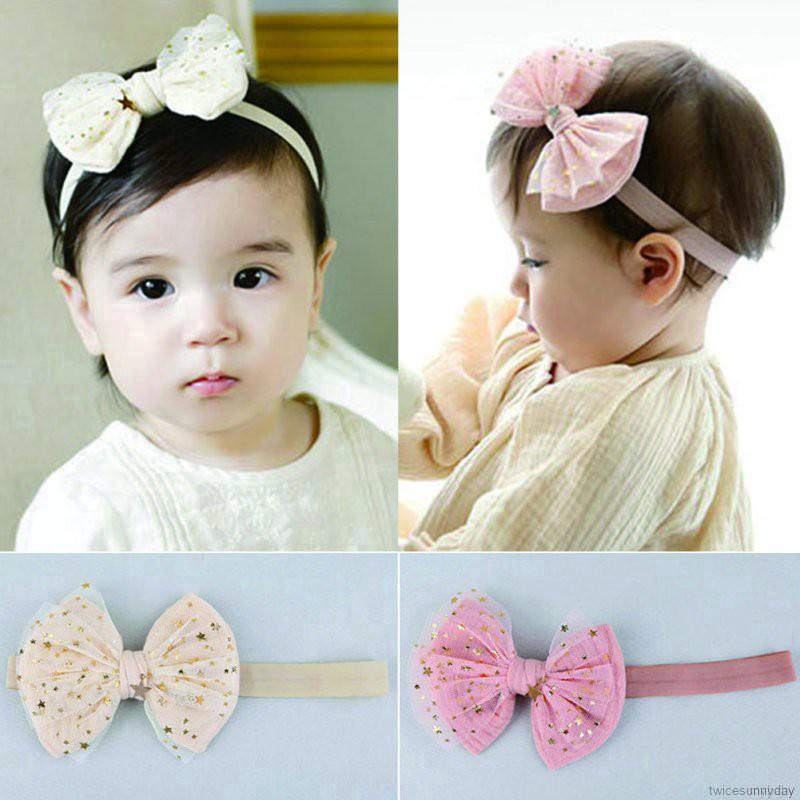 Băng đeo đầu có chi tiết nơ trang trí