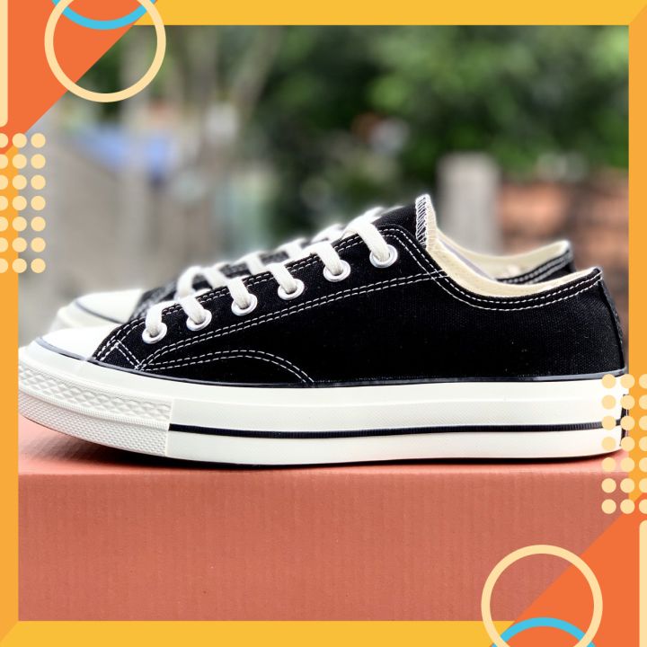 Giày đen trắng cao thấp cho nam nữ