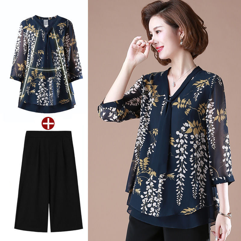 Set áo tay lửng in lá cây kèm quần đen suông cho phụ nữ trung niên | BigBuy360 - bigbuy360.vn