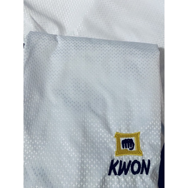 Võ phục thi đấu Taekwondo phiên bản tà dài Vải Kim Cương nhẹ mát