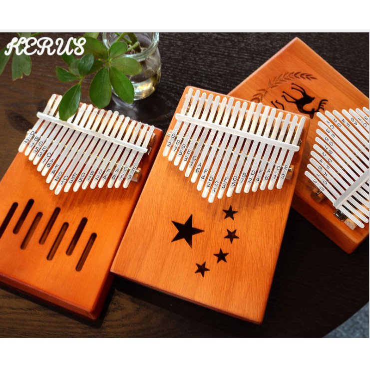 Đàn kalimba 17 phím đặt sản xuất tặng búa chỉnh âm, stick dán màu Gía siêu hời