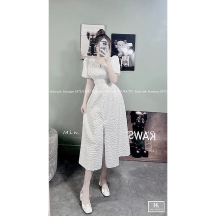 Váy trắng xẻ tà