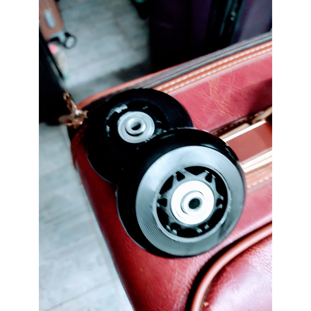Cặp bánh xe đường kính 70mm vòng bi chất liệu TPU siêu bền dùng để thay thế cho các loại vali vải 2 bánh