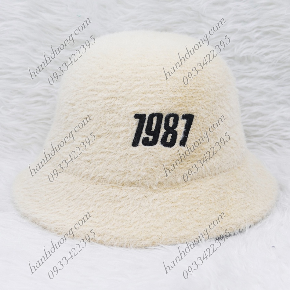 Nón tai bèo vành cụp lông xù hàng quảng châu thêu số 1987, vành rộng 5cm, phía trong có 2 dây rút giúp giữ nón chắt hơn
