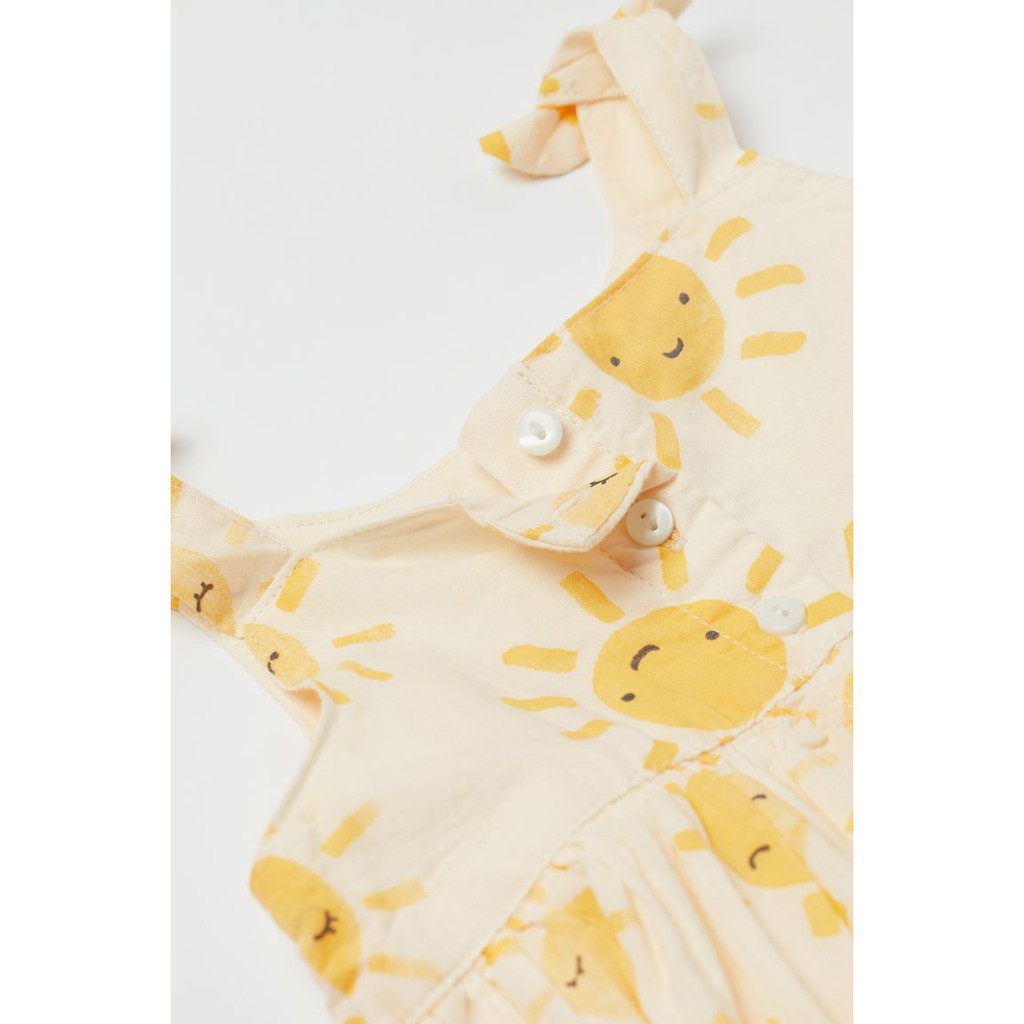 Set váy vàng 2 dây họa tiết mặt trời kèm mũ vải mềm, Hờ mờ UK săn SALE