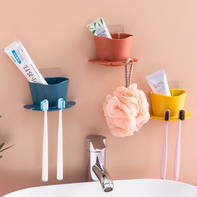 Kệ bàn chải đánh răng dán tường nhà tắm với 4 khe cắm bàn chải và 1 hộp để kem đánh răng tiện lợi