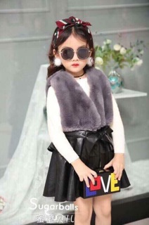 Đầm gile lông da.